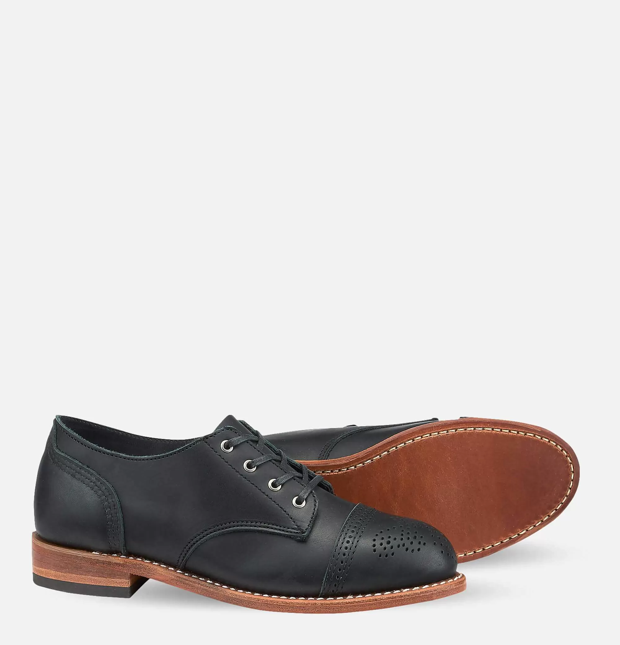 Botas para Mujer RED WING Modelo 3434 en Avellana Negro - Calidad Artesanal y Estilo Atemporal 

Botas Industriales RED WING 3434 Mujer - Color Avellana Oscuro con Soporte Anatómico 

Zapatos RED WING 3434 Edición Femenina - Cuero Encerado Avellana/Negro para Rutina Activa