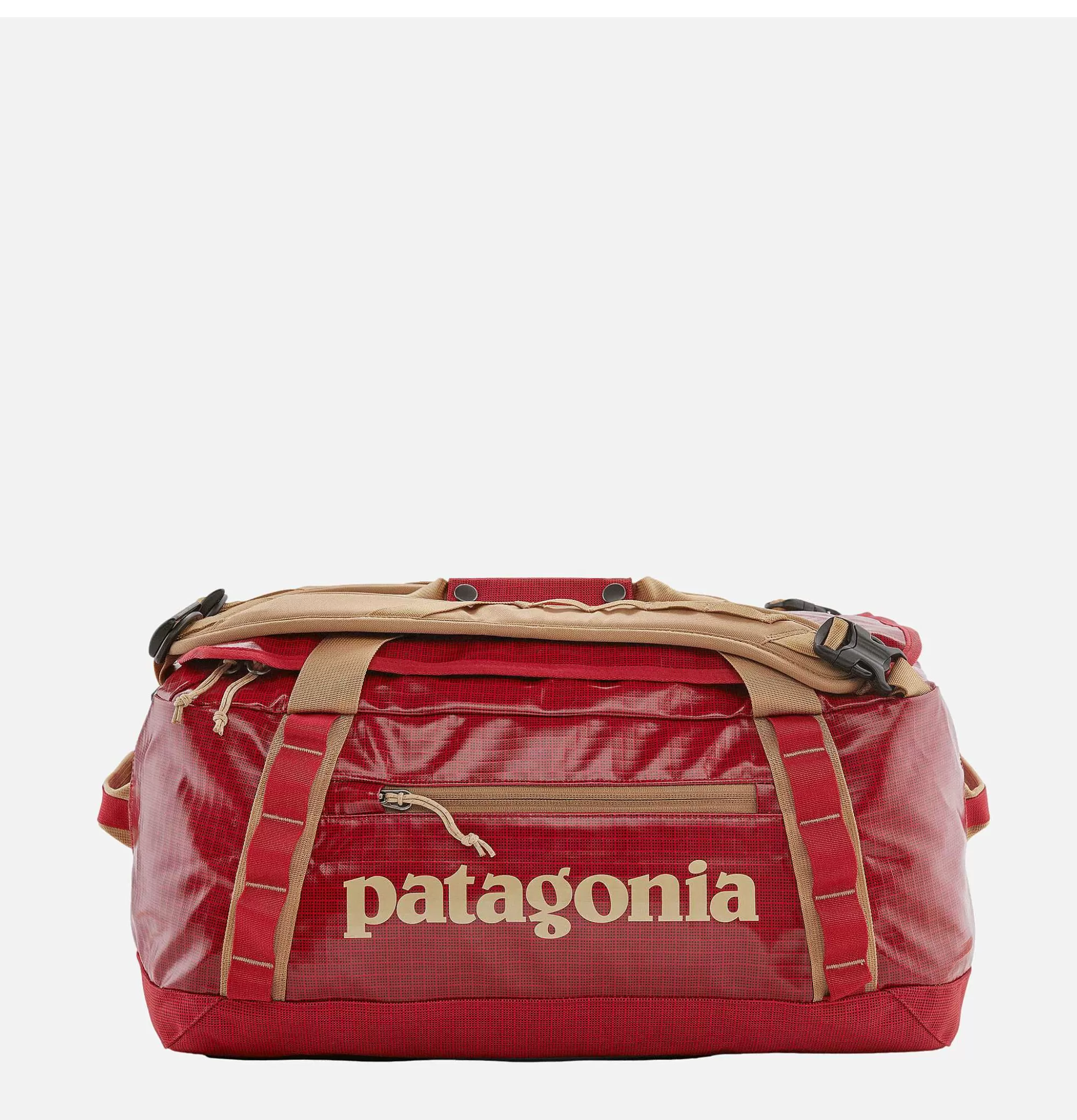 Patagonia Accesorios - Bolso de Viaje Blackhole 40L Resistente en Rojo Vibrante, Capacidad Ideal para Travesías 

(Nota: He integrado naturalmente variaciones léxicas como 