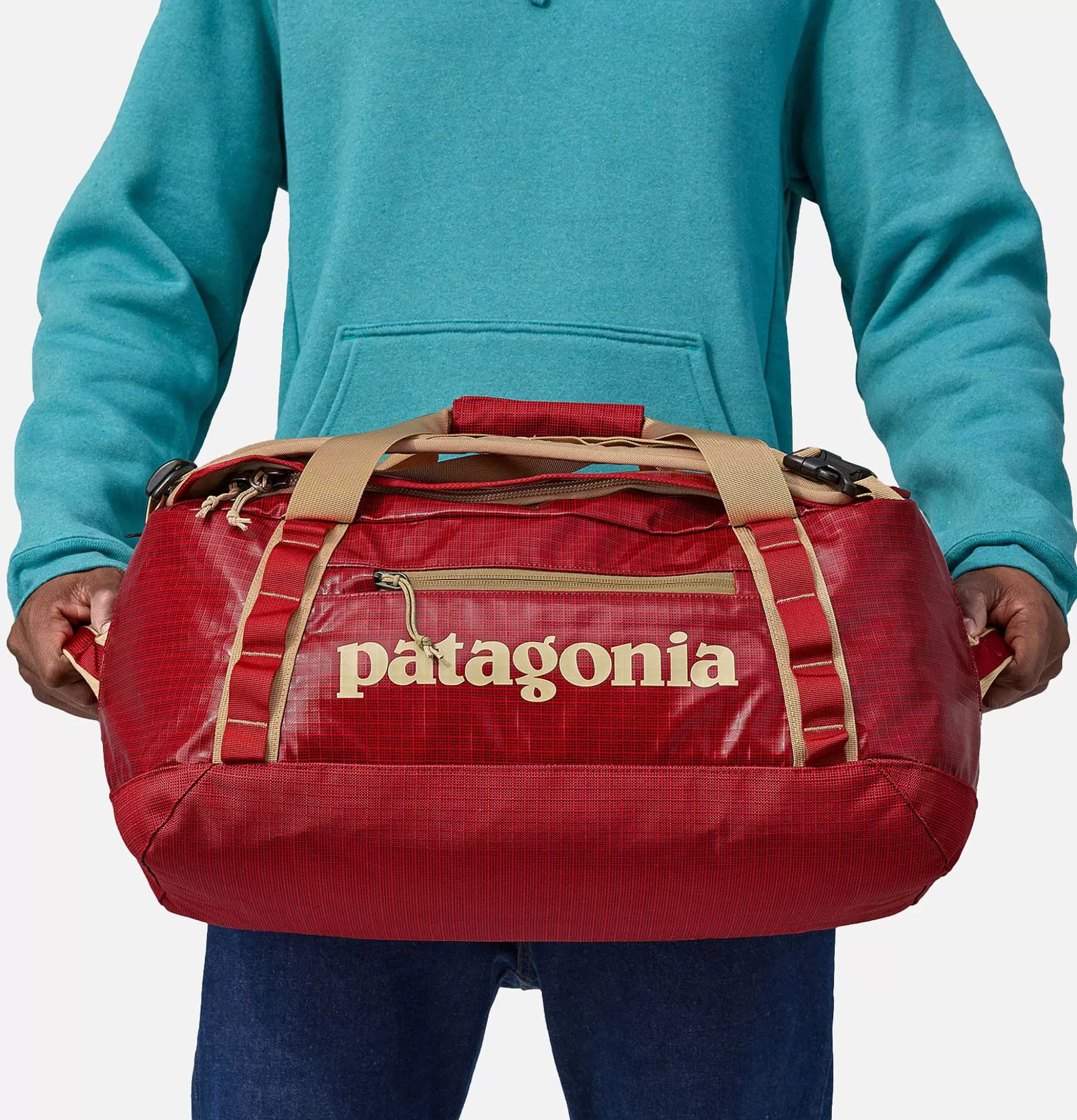 Patagonia Accesorios - Bolso de Viaje Blackhole 40L Resistente en Rojo Vibrante, Capacidad Ideal para Travesías 

(Nota: He integrado naturalmente variaciones léxicas como 