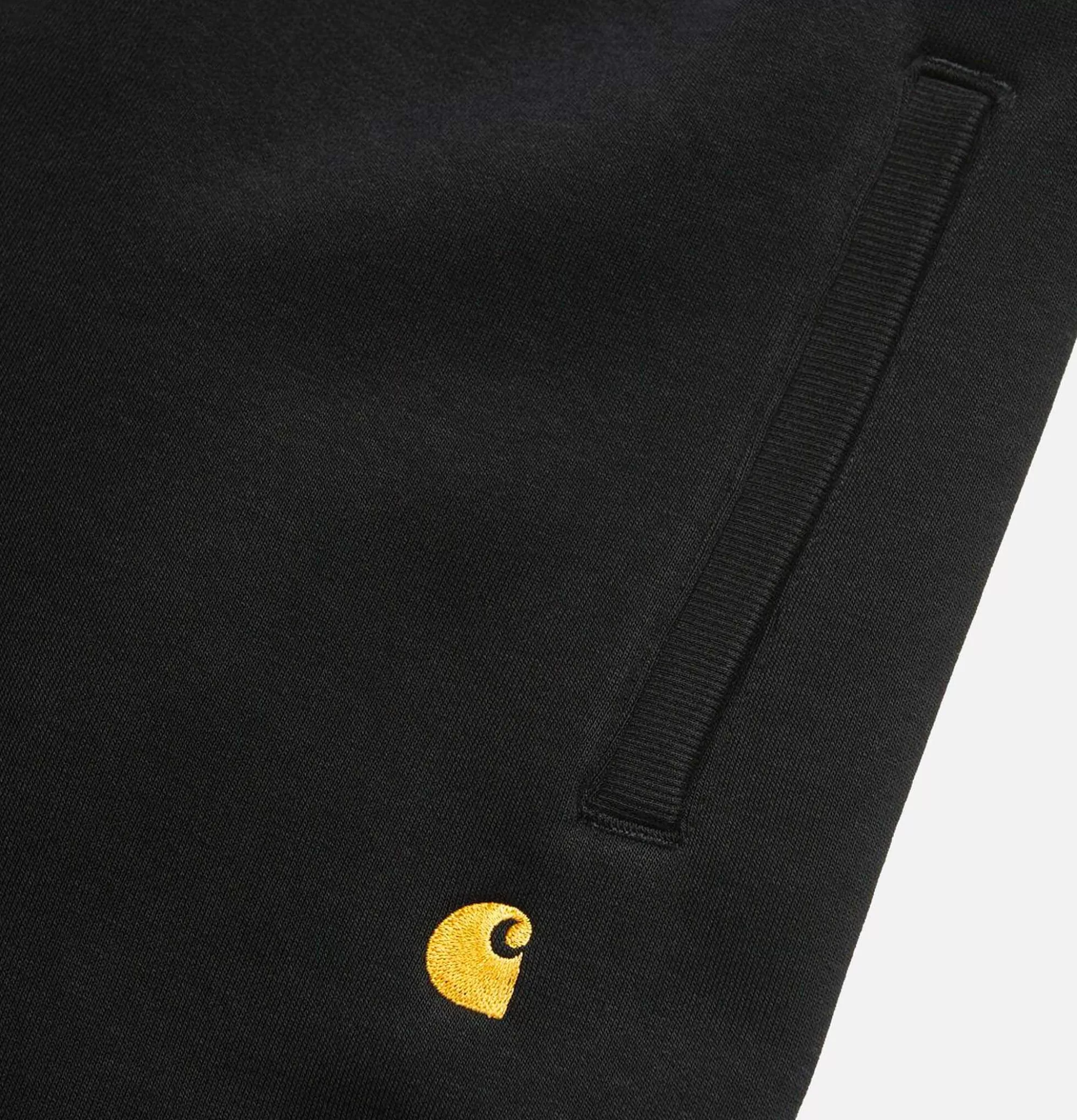 CARHARTT WIP - Pantalón Chase Deportivo Urbano en Negro | Corte Clásico y Tejido Resistente