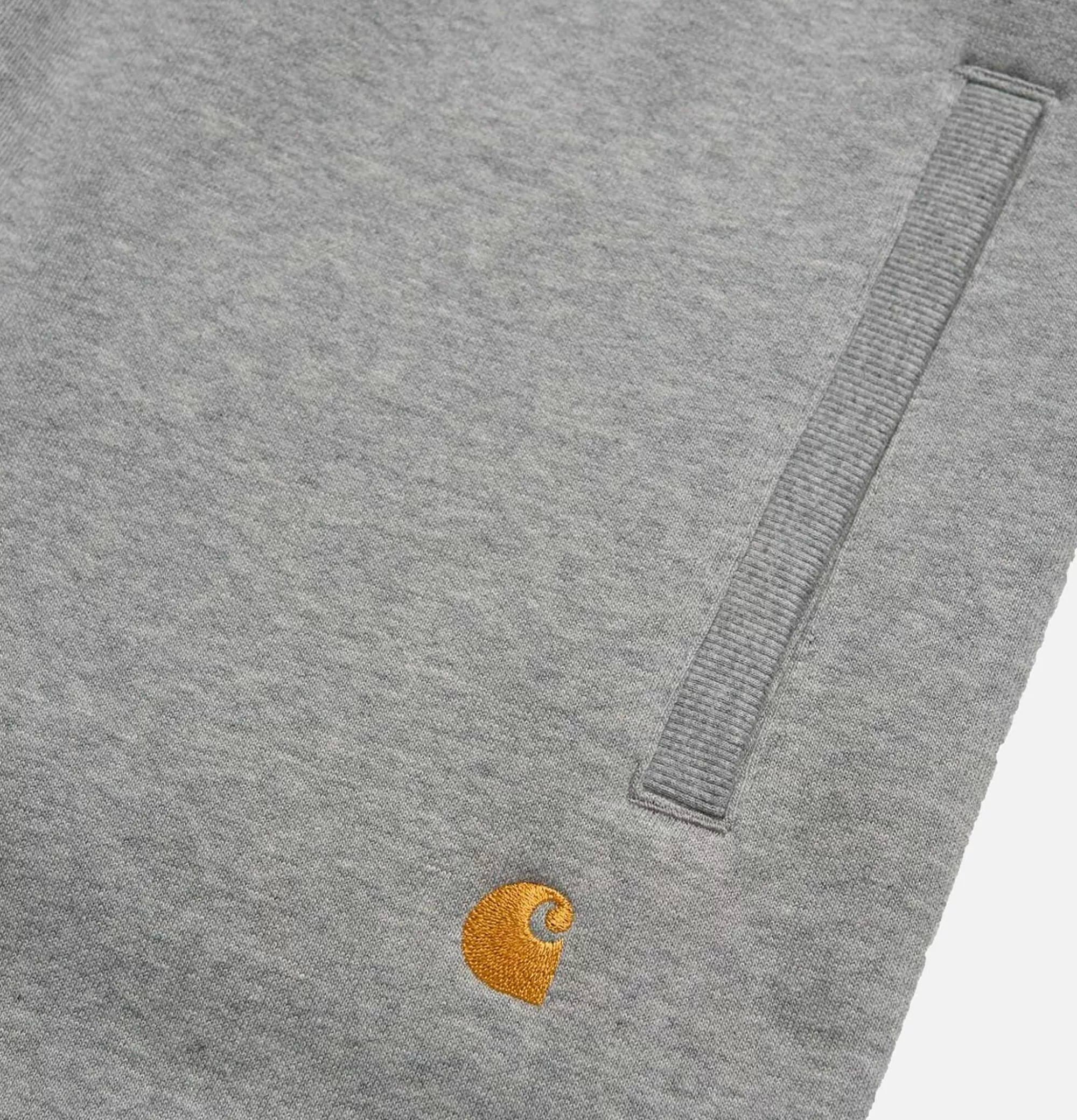Pantalones deportivos CARHARTT WIP Chase - Gris Melange | Comodidad y estilo urbano en sweatpants casuales