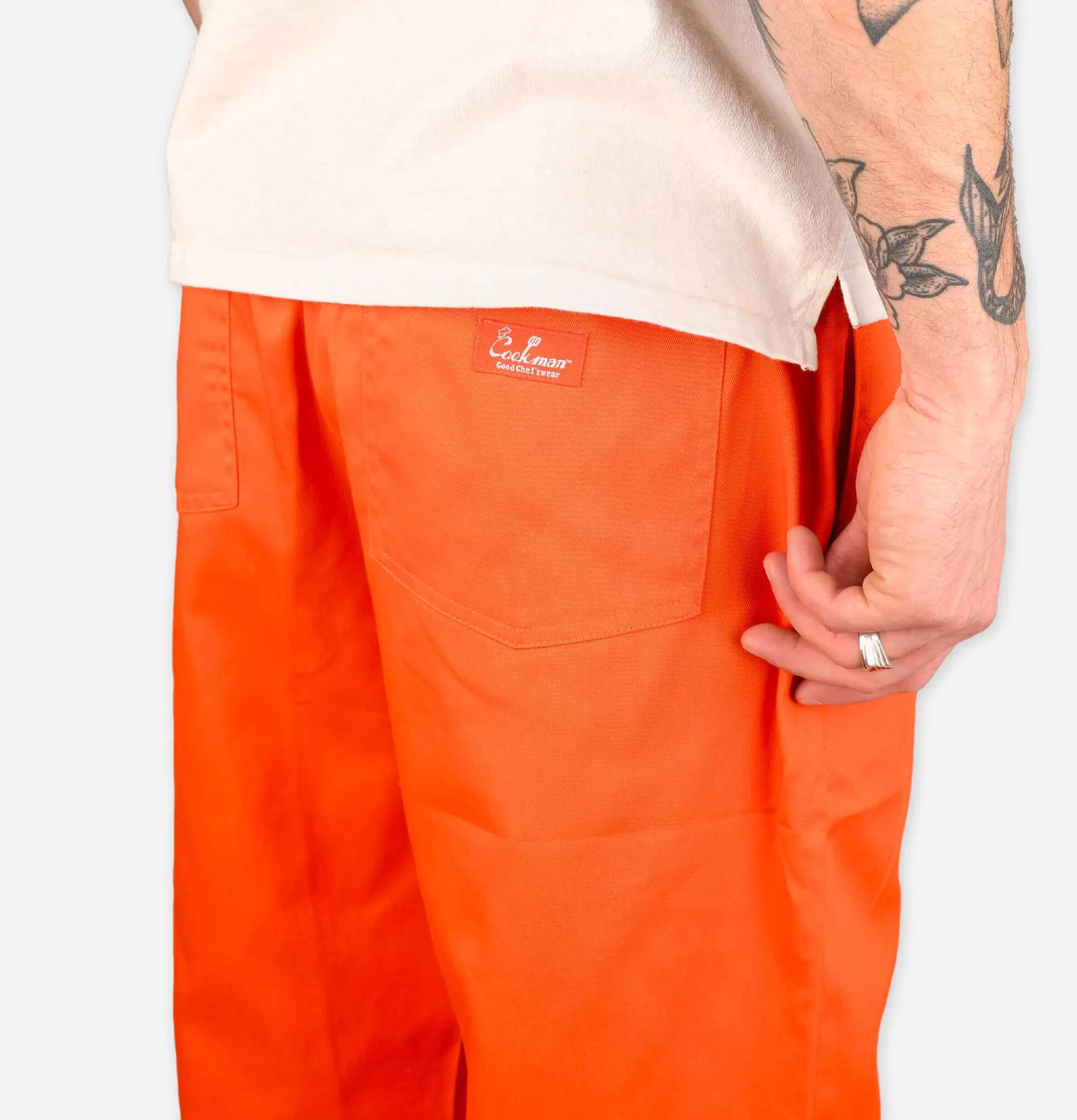 Pantalones Profesionales para Chef COOKMAN - Ajuste Ergonómico y Duradero en Color Naranja Vibrante