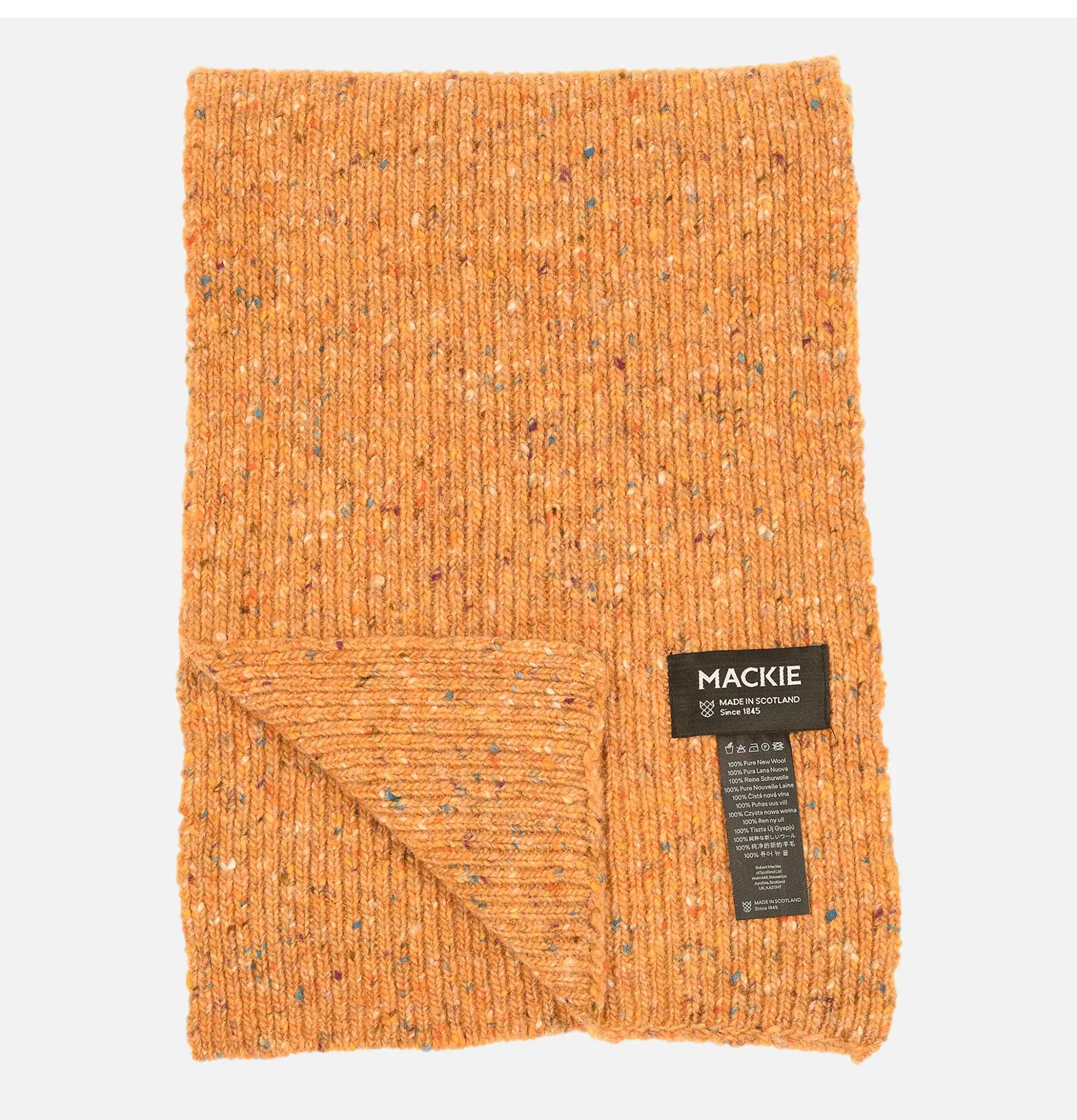Bufanda tejida estilo irlandés Donegal en tono hickory • Accesorios de invierno: guantes de piel y gorros tejidos • Colección Robert Mackie